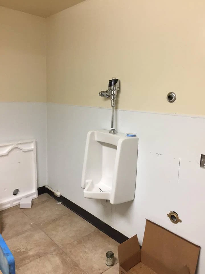 Commercial restroom plumbing fixture repair by M.Y. Handyman Services